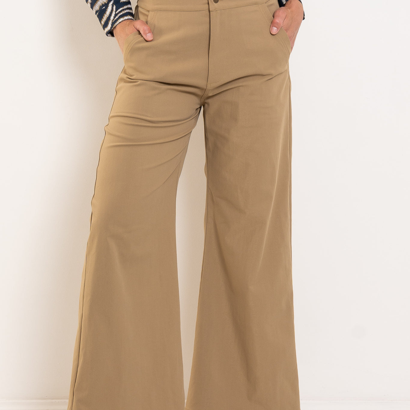 Philippa wears size 10 in Trench colour